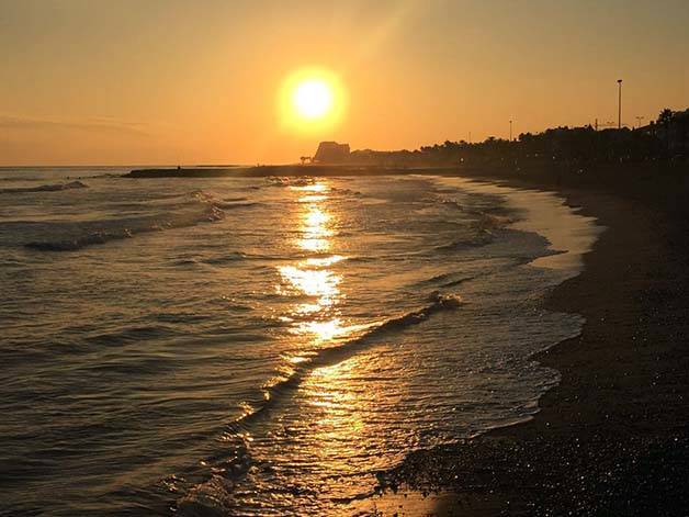 sitges sunset over the sea