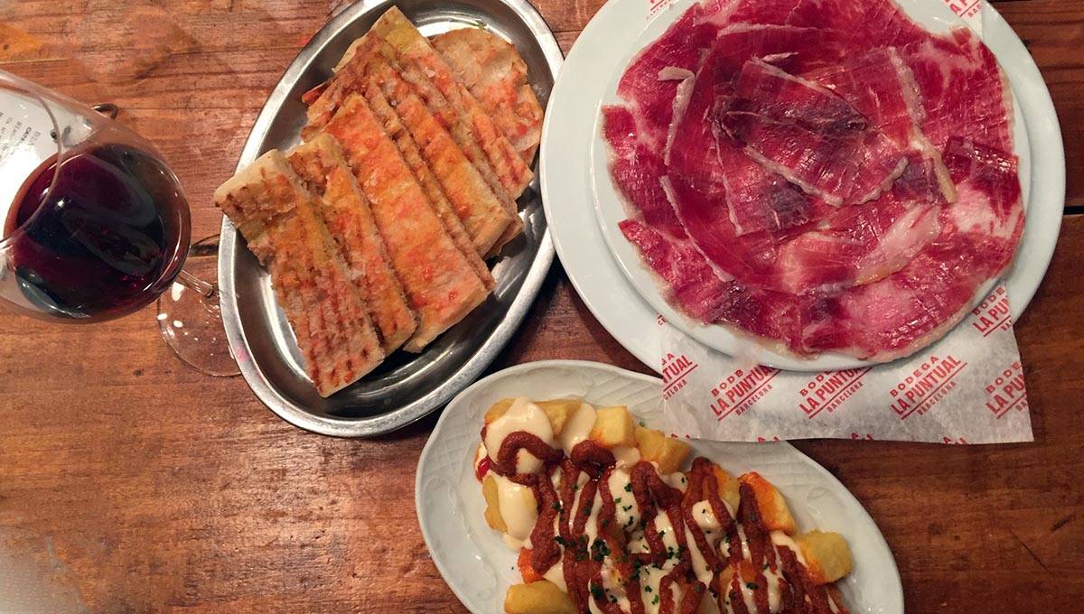 tapas at Bodega la Puntual: ham and patatas brava